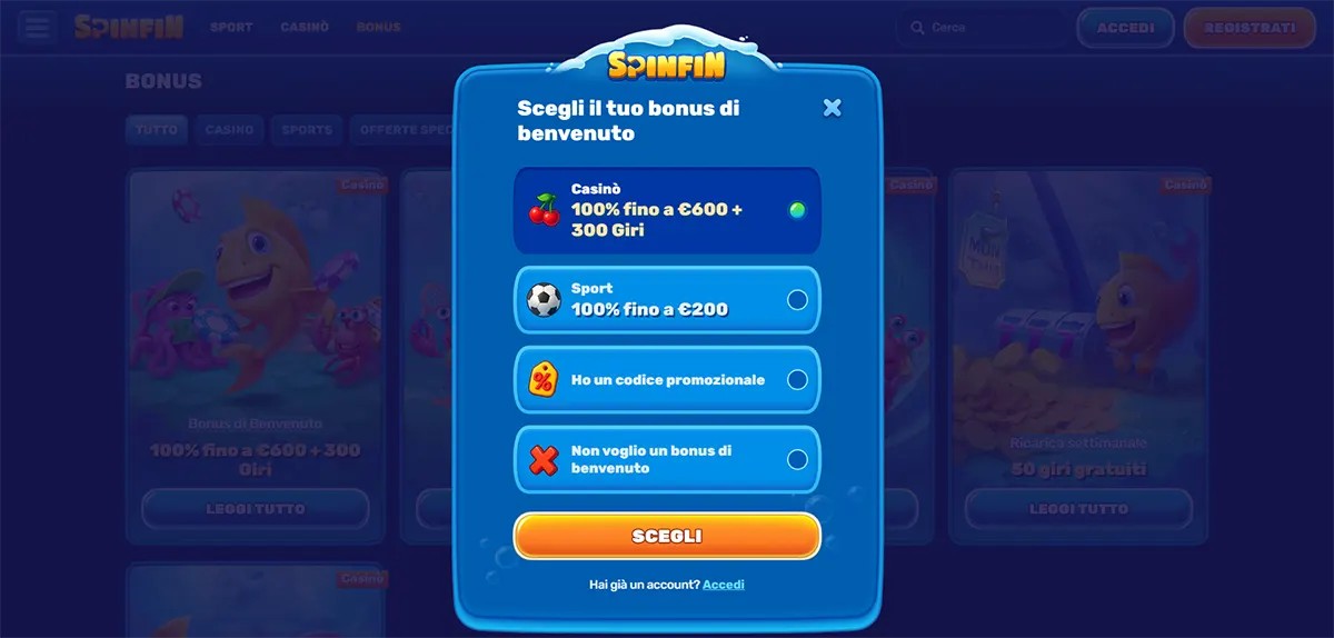 Welcome bonus selection modal (Italian localisation) for Spinfin Casino, allowing users to choose between a casino bonus (100% fino a €600 + 300 giri), a sports bonus (100% fino a €200), entering a promo code, or declining the bonus, with a prominent “Scegli” button and login option below